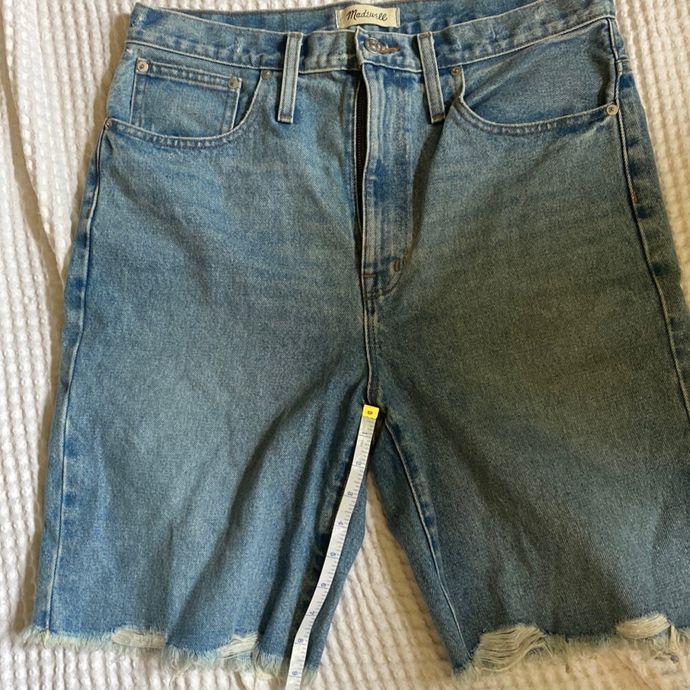 Distressed denim shorts